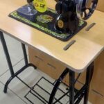 Sincer sewing machine with table